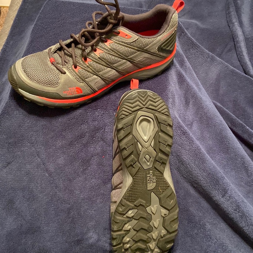 The North Face Shoes. Only worn once.  Black, Gray and Red
